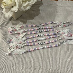 1 handmade unicorn ribbon bracelet with the  ( word you chose)